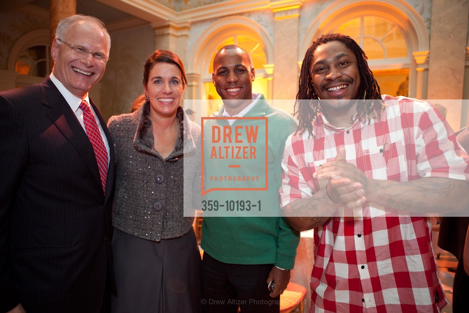 Mark Laret with Kelley O'Brien, Marlon Evans and Marshawn Terrell Lynch