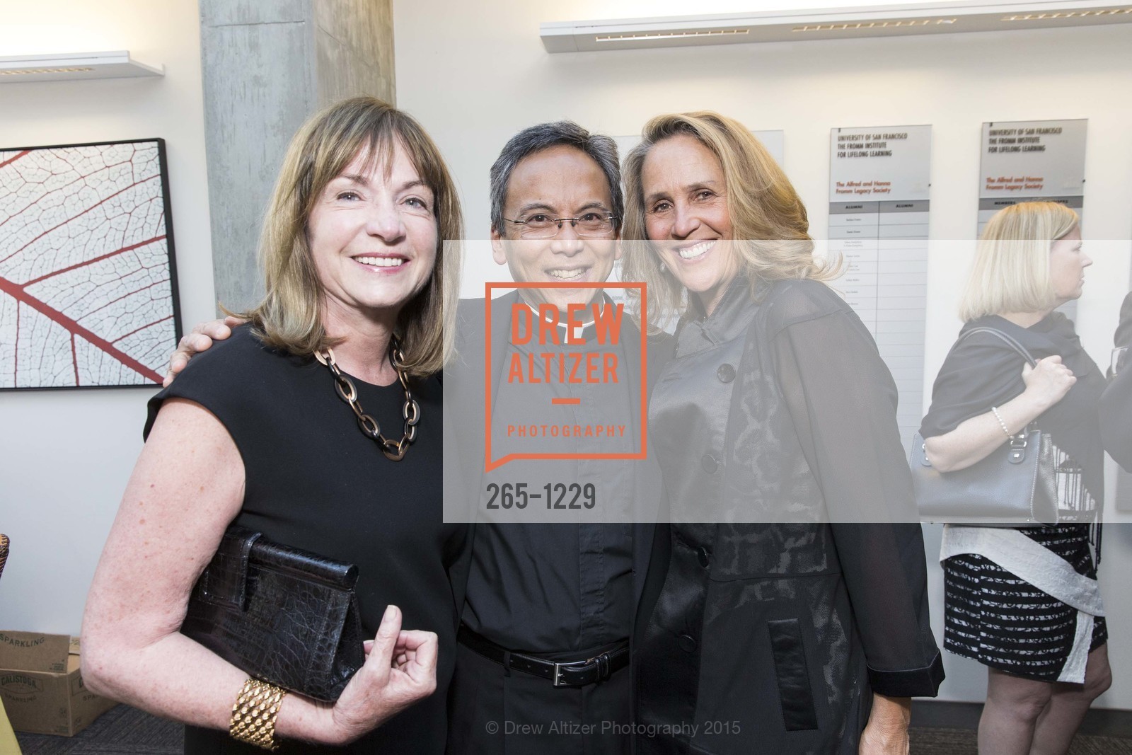 Sue Marineau, Father Sonny Manuel, Michelle Jarret Skaff, USF California Prize Dinner, University of San Francisco. San Francisco, California, March 29th, 2015, Photo #265-1229 Sue Marineau, Father Sonny Manuel, Michelle Jarret Skaff, Photo #265-1229
