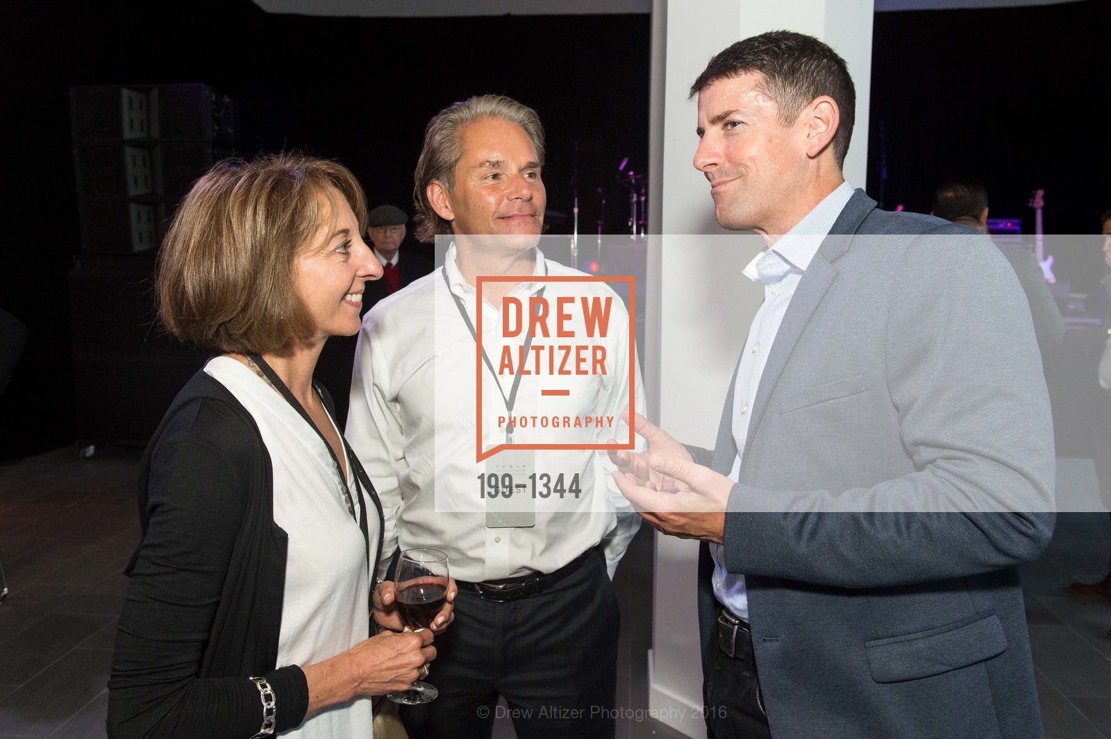 Teresa Briggs, David Cush, John McNeill, Tesla San Francisco Store Opening VIP Event, 999 Van Ness Ave, San Francisco, CA 94109. 999 Van Ness Ave, San Francisco, CA 94109, August 9th, 2016, Photo #199-1344 Teresa Briggs, David Cush, John McNeill, Photo #199-1344
