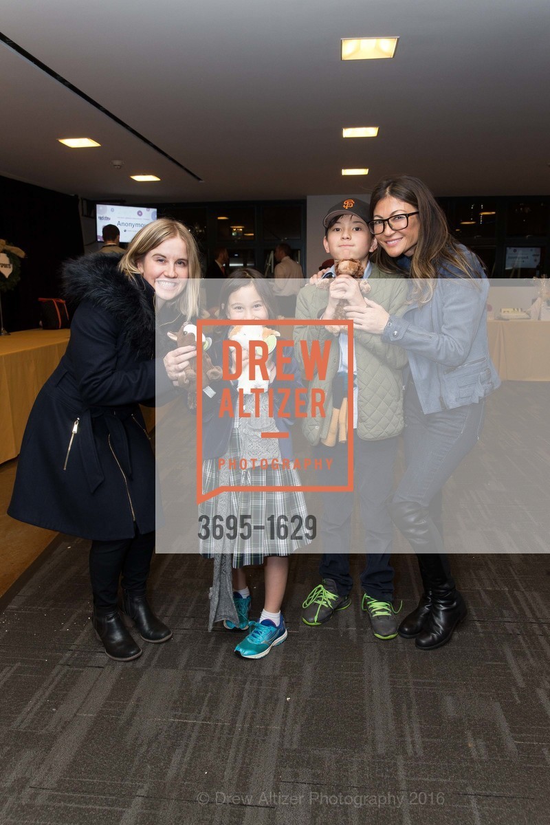 Mary Krempa, Scout Phoebe Davenport-Grose, Daniel Davenport-Grose, Susan Davenport, Wender Weis Foundation for Children’s Holiday Heroes 2016, AT&T Park. 2525 Van Ness St, December 5th, 2016, Photo #3695-1629 Mary Krempa, Scout Phoebe Davenport-Grose, Daniel Davenport-Grose, Susan Davenport, Photo #3695-1629