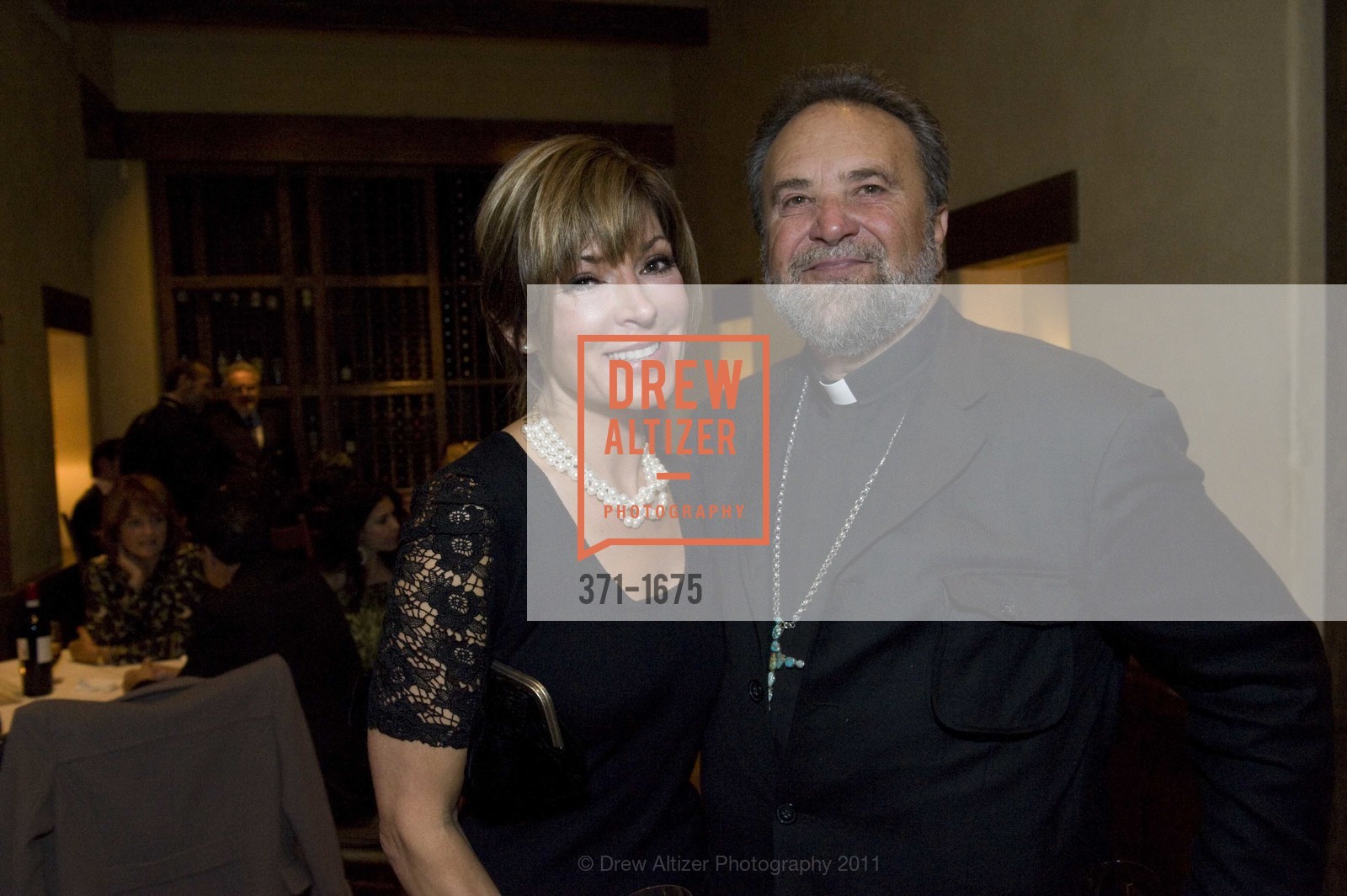 Vicki Liviakis, Father John Bakas, HELLENIC Charity Ball Welcome Reception at Kokkari, US, November 11th, 2011, Photo #371-1675 Vicki Liviakis, Father John Bakas, Photo #371-1675
