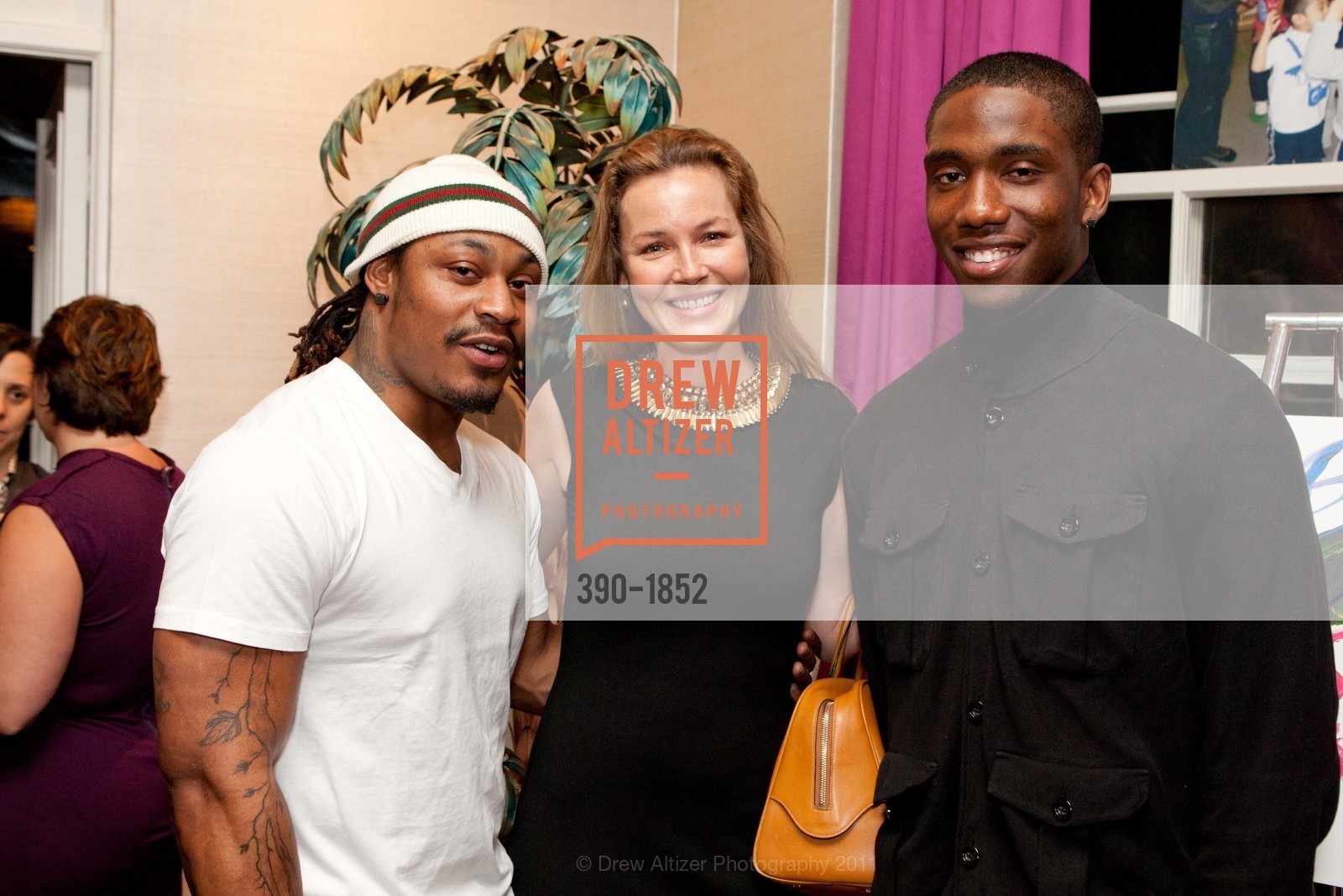Marshawn Lynch, Connie Nielsen, Josh Johnson, Hollywood Personalities team up with San Francisco-based COMPASS FAMILY SERVICES in Support of Low Income Families, US, March 8th, 2011, Photo #390-1852 Marshawn Lynch, Connie Nielsen, Josh Johnson, Photo #390-1852