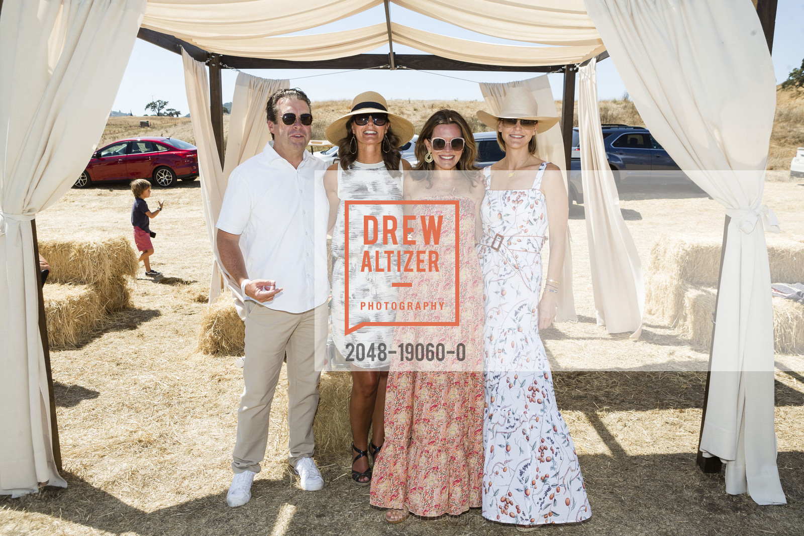Jim Calhoun, Megan Calhoun, Andrena Felger, Kristin Evans, 2019 Oyster Cup Charity Polo Tournament, Cerro Pampa Polo Club. 1295 San Antonio Road, August 24th, 2019, Photo #2048-19060-0 Jim Calhoun, Megan Calhoun, Andrena Felger, Kristin Evans, Photo #2048-19060-0