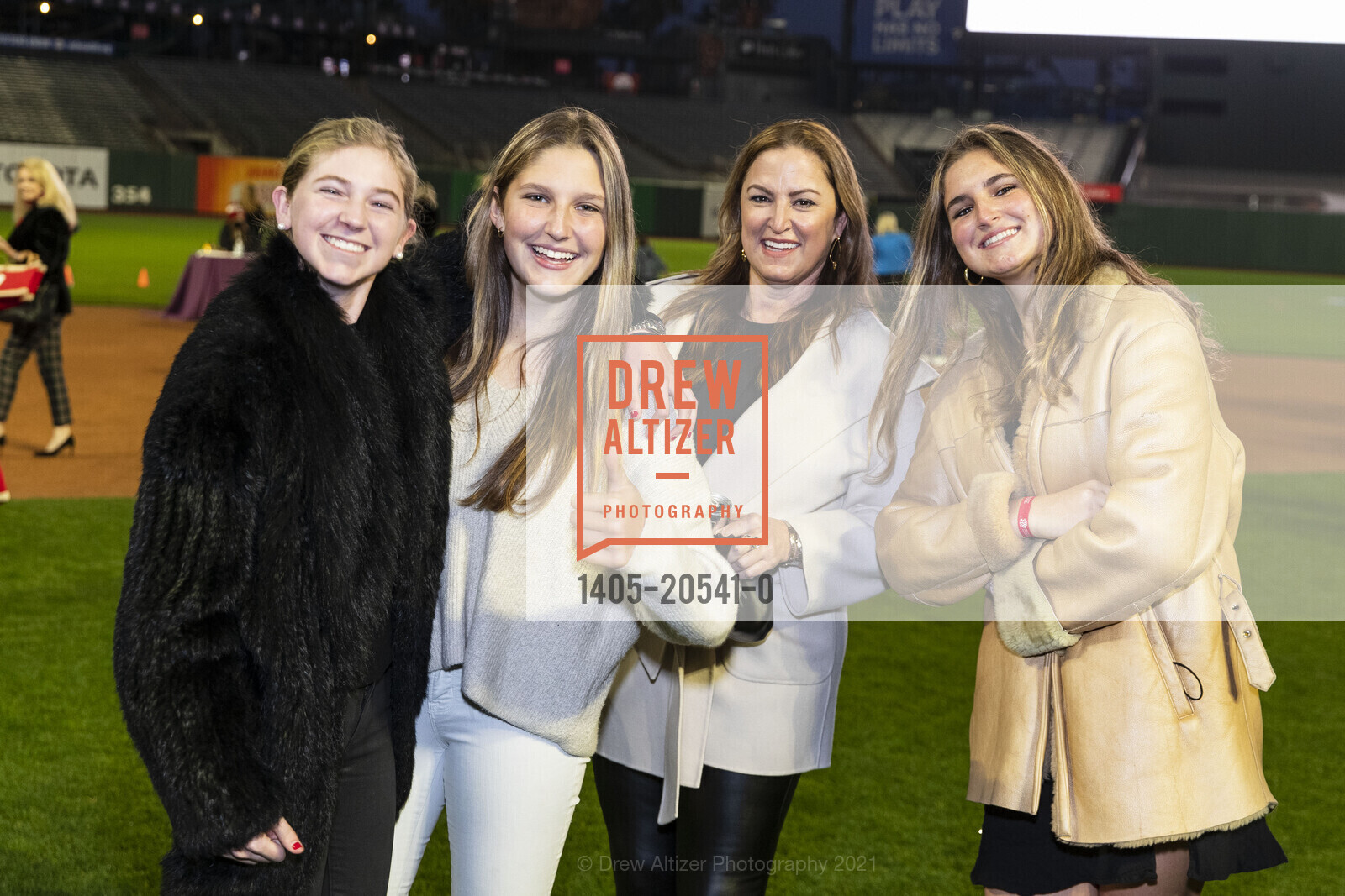 Tracy Carney Skytt, Chloe Frushtick, Jessica Grimes, Sophia Frushtick, Holiday Heroes, 24 Willie Mays Plaza. 24 Willie Mays Plaza, December 7th, 2021, Photo #1405-20541-0 Tracy Carney Skytt, Chloe Frushtick, Jessica Grimes, Sophia Frushtick, Photo #1405-20541-0
