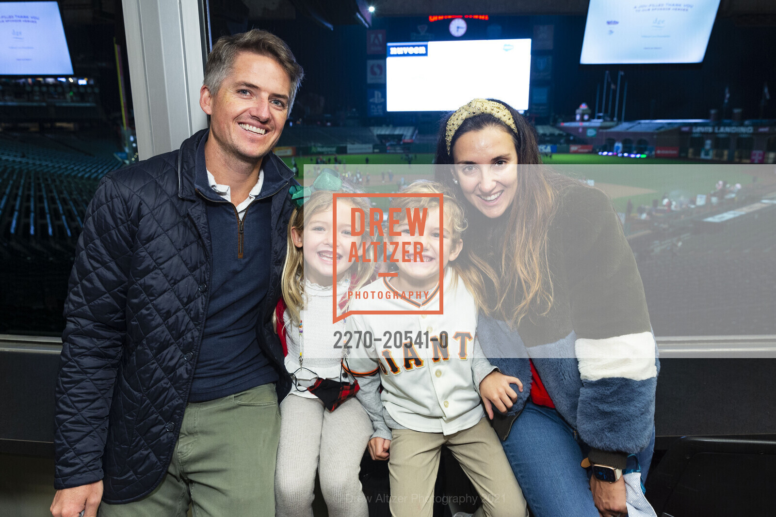 Mark Kniesche, Olivia Kniesche, Jackson Kniesche, Julia Kniesche, Holiday Heroes, 24 Willie Mays Plaza. 24 Willie Mays Plaza, December 7th, 2021, Photo #2270-20541-0 Mark Kniesche, Olivia Kniesche, Jackson Kniesche, Julia Kniesche, Photo #2270-20541-0