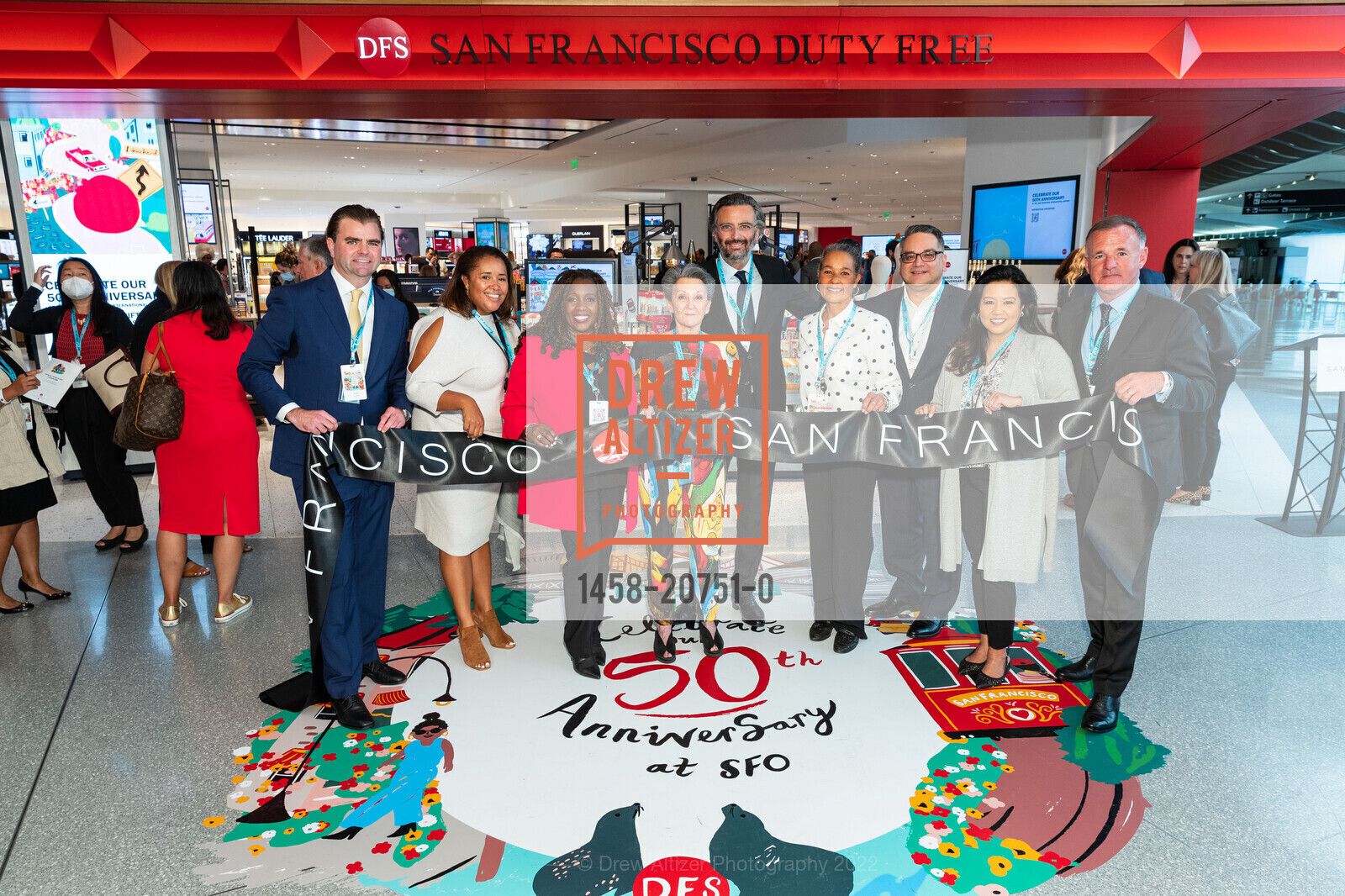Karl Sutcliffe, Bianca Mallory, Apryl Stewart, Manuel Soto, Rilla Ginsberg, Benjamin Vuchot, Judy Tabamina Soto, Martin Matthews, Clarissa Mamaril, DFS Celebrates Grand Re-Opening at SFO, San Francisco International Airport. San Francisco International Airport, Terminal G, June 1st, 2022, Photo #1458-20751-0 Karl Sutcliffe, Bianca Mallory, Apryl Stewart, Manuel Soto, Rilla Ginsberg, Benjamin Vuchot, Judy Tabamina Soto, Martin Matthews, Clarissa Mamaril, Photo #1458-20751-0