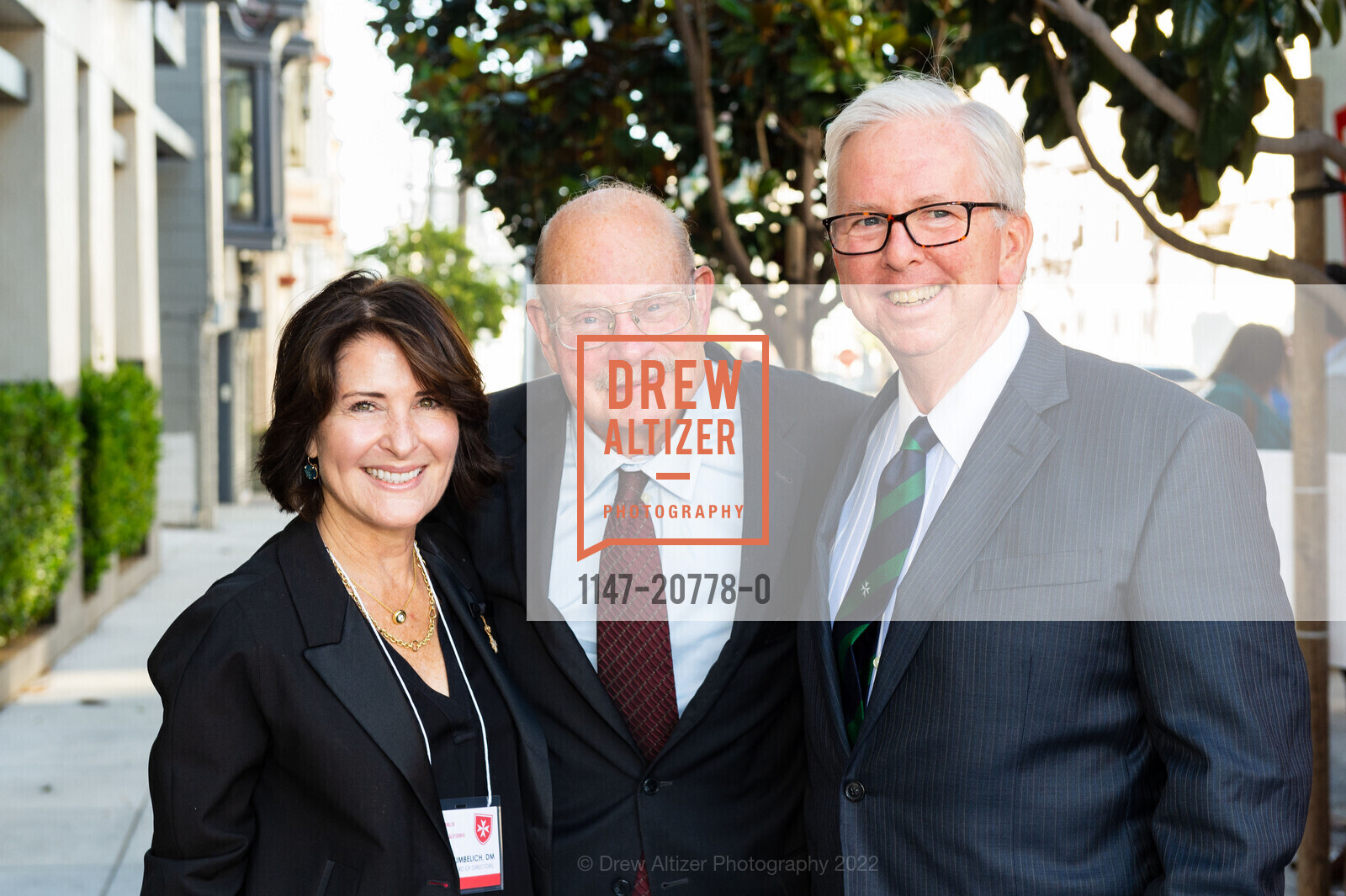 Sara Cumbelich, John Rengel, John Christian, Order of Malta Clinic's Honorary Committee Party, 1601 Larkin St. 1601 Larkin St, June 14th, 2022, Photo #1147-20778-0 Sara Cumbelich, John Rengel, John Christian, Photo #1147-20778-0