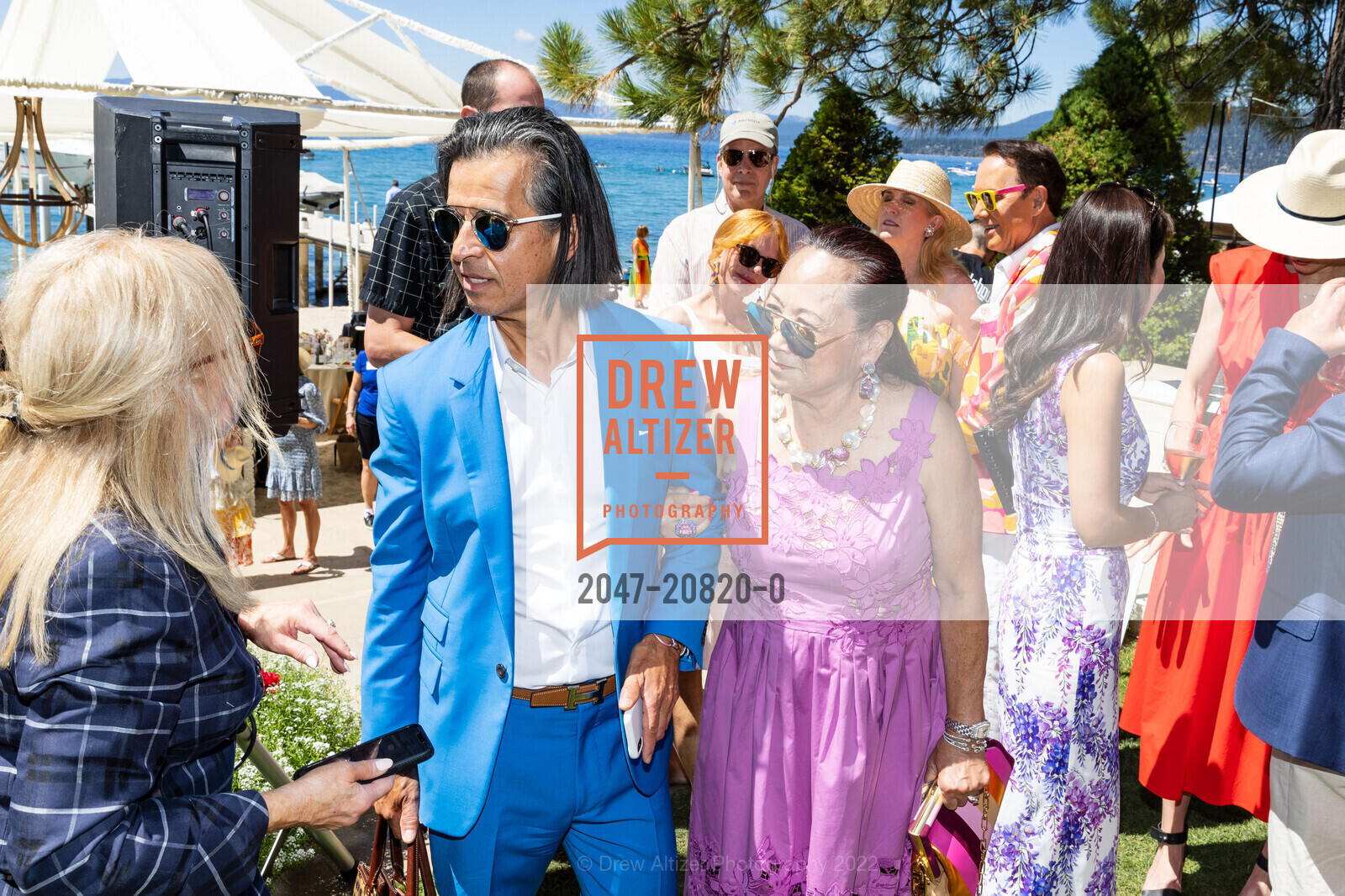 Gustavo Tabares, Eileen Yeung, Saks Fifth Avenue x Oscar De La Renta fashion show Benefitting The League to Save Lake Tahoe, Lake Tahoe, August 6th, 2022, Photo #2047-20820-0 Gustavo Tabares, Eileen Yeung, Photo #2047-20820-0