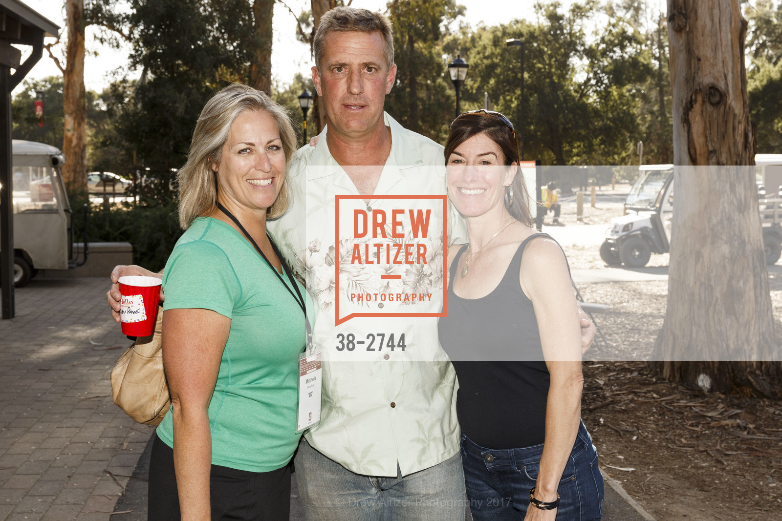 Michele Dreyfuss, John Paye, Laura Putnam, Stanford Re-Union Luau Tailgate party 2017, Lausen Picnic Area at Stanford. (SE corner of Lasuen Ave. and Campus Drive), October 14th, 2017, Photo #38-2744 Michele Dreyfuss, John Paye, Laura Putnam, Photo #38-2744