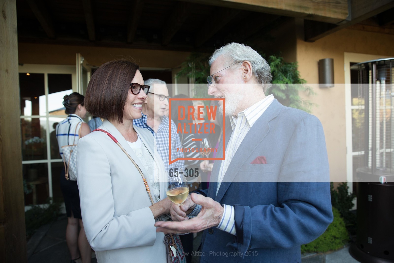Ann Cogan, Bill Harlan, Gucci & Vogue Dinner, Auberge dr Soliel. Auberge dr Soliel, September 22nd, 2015, Photo #65-305 Ann Cogan, Bill Harlan, Photo #65-305