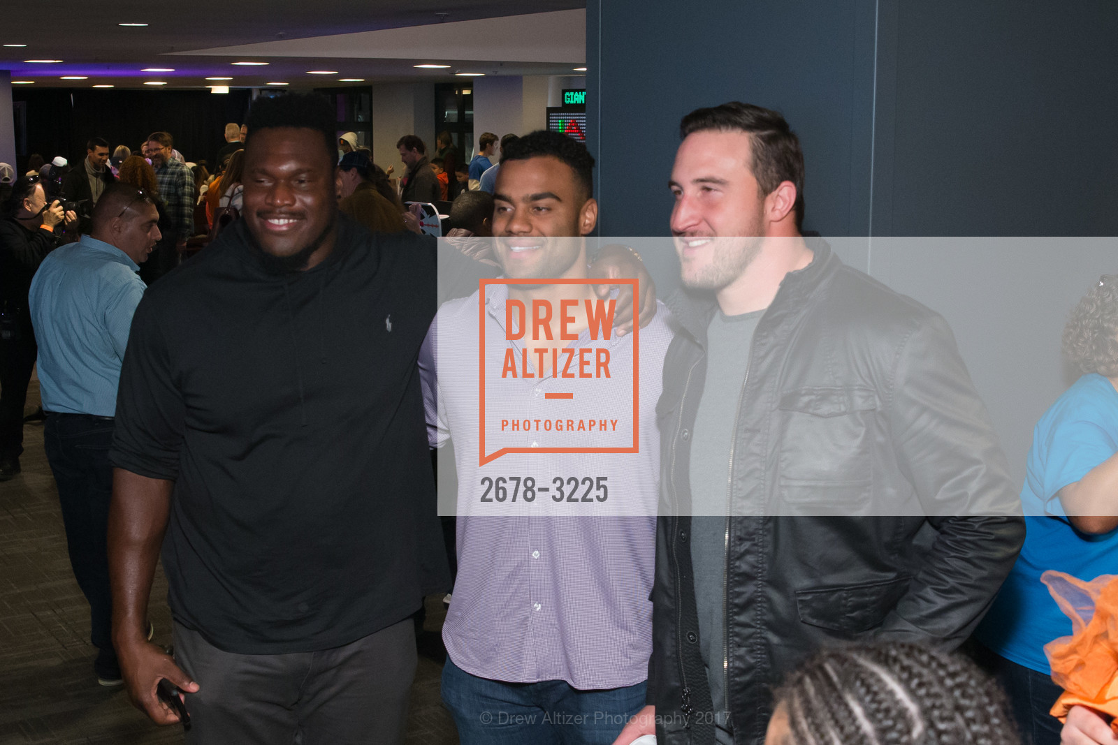 Kelechi Osemele, Soloman Thomas, Joe Staley, Holiday Heroes 2017, AT&T Park. 24 Willie Mays Plaza, San Francisco, CA, December 5th, 2017, Photo #2678-3225 Kelechi Osemele, Soloman Thomas, Joe Staley, Photo #2678-3225