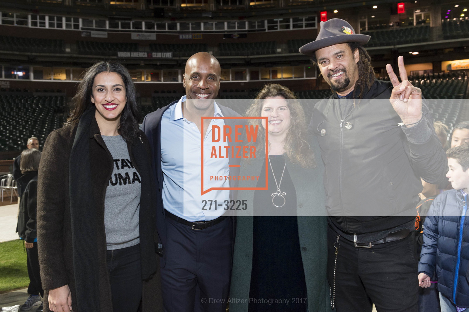 Sara Agah Franti, Barry Bonds, Amy Wender-Hoch, Michael Franti, Holiday Heroes 2017, AT&T Park. 24 Willie Mays Plaza, San Francisco, CA, December 5th, 2017, Photo #271-3225 Sara Agah Franti, Barry Bonds, Amy Wender-Hoch, Michael Franti, Photo #271-3225