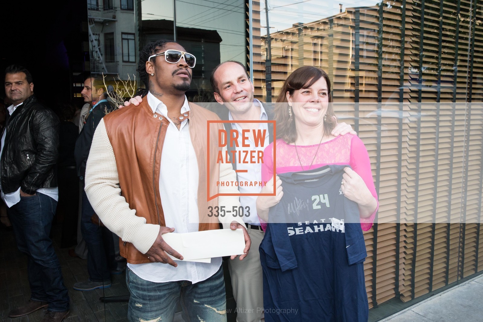 Marshawn Lynch, Greg Roberts, Lynne Roberts, NFL CELEBRITY Bartending Event, US. US, April 7th, 2014,Drew Altizer, Drew Altizer Photography, full-service agency, private events, San Francisco photographer, photographer california