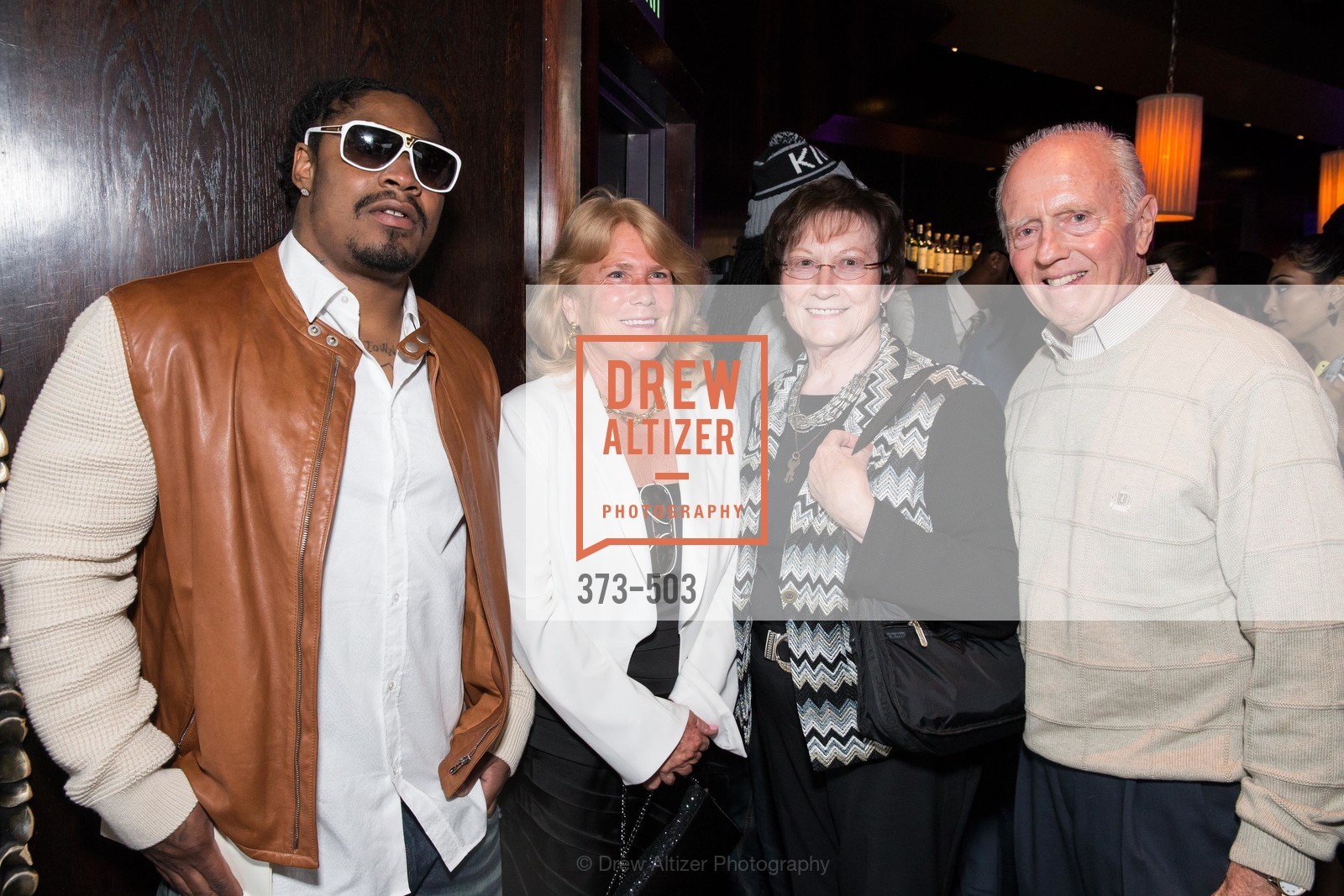 Marshawn Lynch, Mary Hendrickson, John Korgman, NFL CELEBRITY Bartending Event, US. US, . US, Photo #373-503 Marshawn Lynch, Mary Hendrickson, John Korgman, Photo #373-503