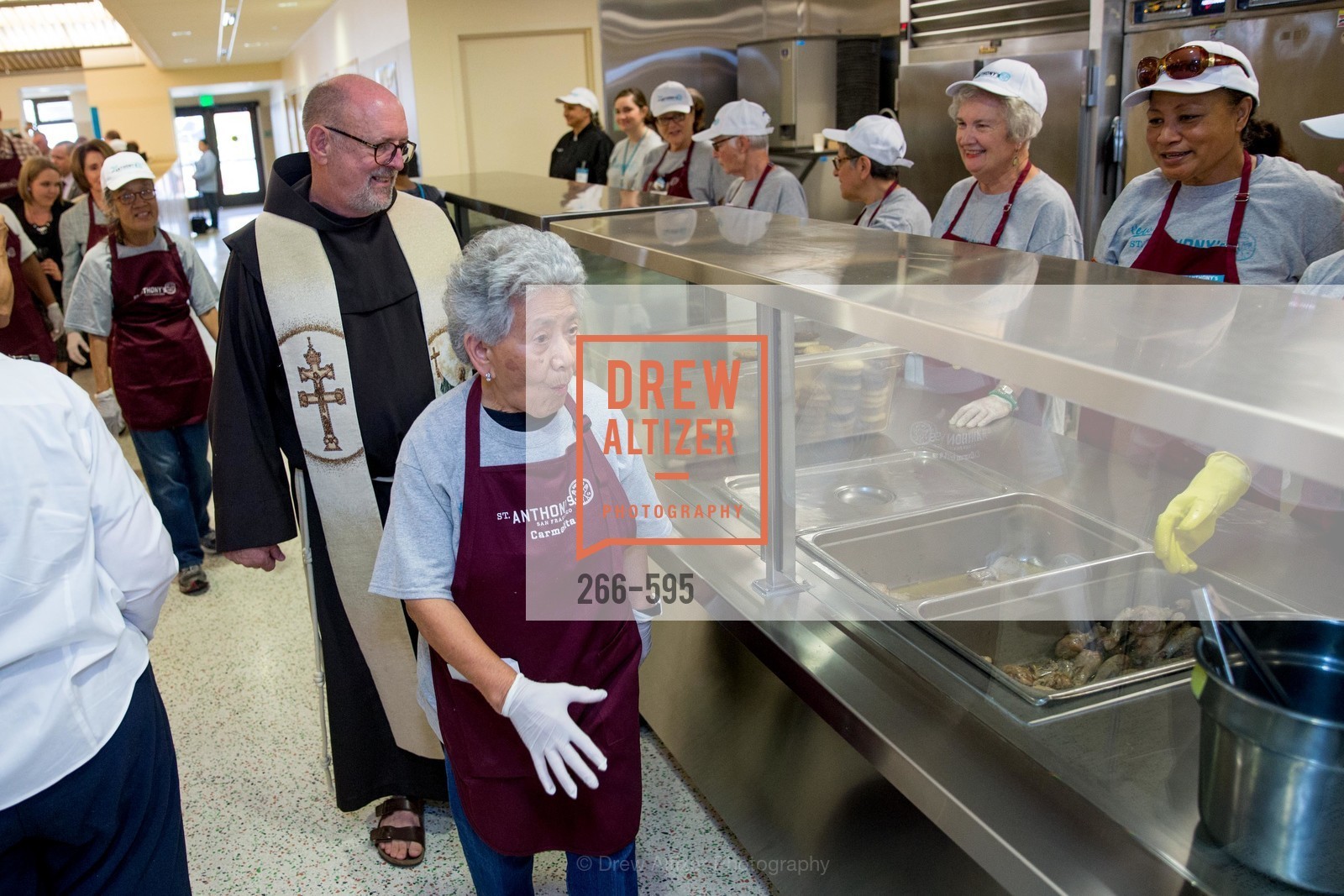 Father John Hardin, Carmelita Lozano, ST. ANTHONY'S Dining Room Ribbon Cutting Ceremony, US, October 5th, 2014, Photo #266-595 Father John Hardin, Carmelita Lozano, Photo #266-595