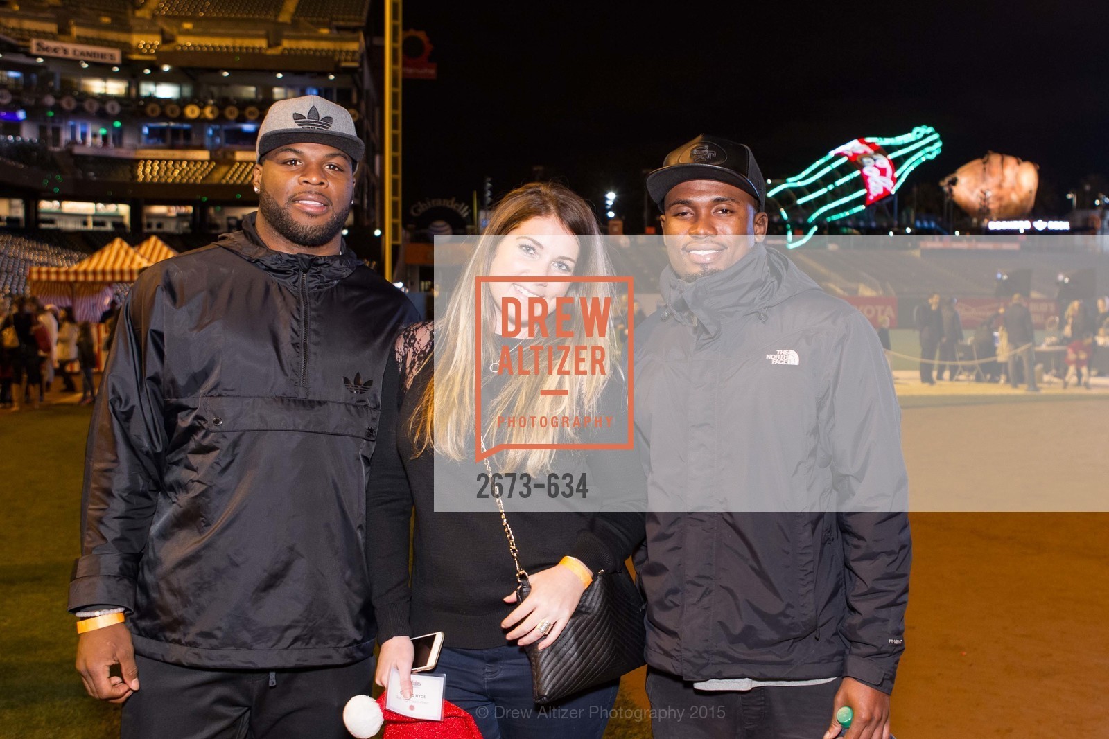 Carlos Hyde, Rebecca Otto, Greg Pratt, Holiday Heroes 2015, AT&T Park, December 7th, 2015, Photo #2673-634 Carlos Hyde, Rebecca Otto, Greg Pratt, Photo #2673-634