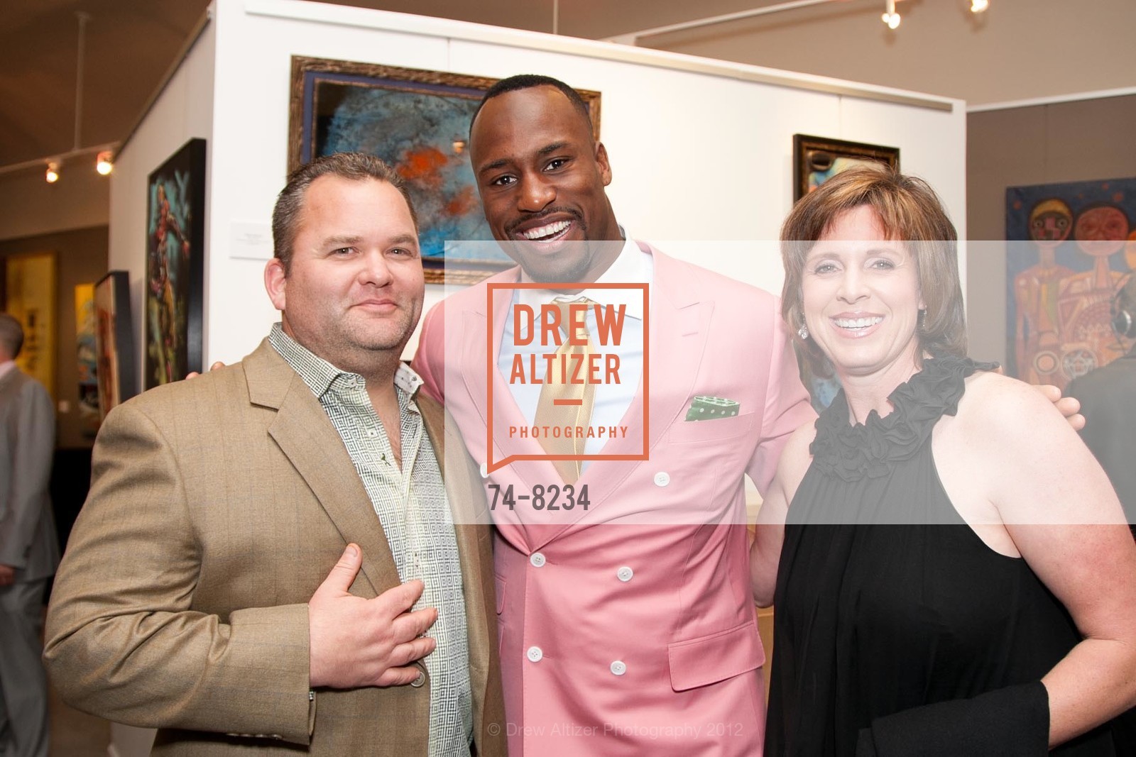 Greg Roman, Vernon Davis, Dana Roman, Davis Celebrates the Grand Opening of GALLERY 85, US, December 10th, 2012, Photo #74-8234 Greg Roman, Vernon Davis, Dana Roman, Photo #74-8234