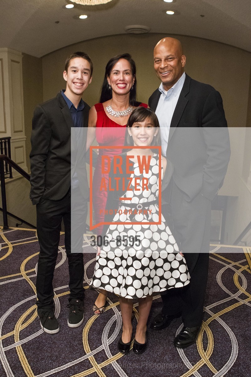 Juanito Cruz with Kim Burton Mikala Cruz and Ronnie Lott